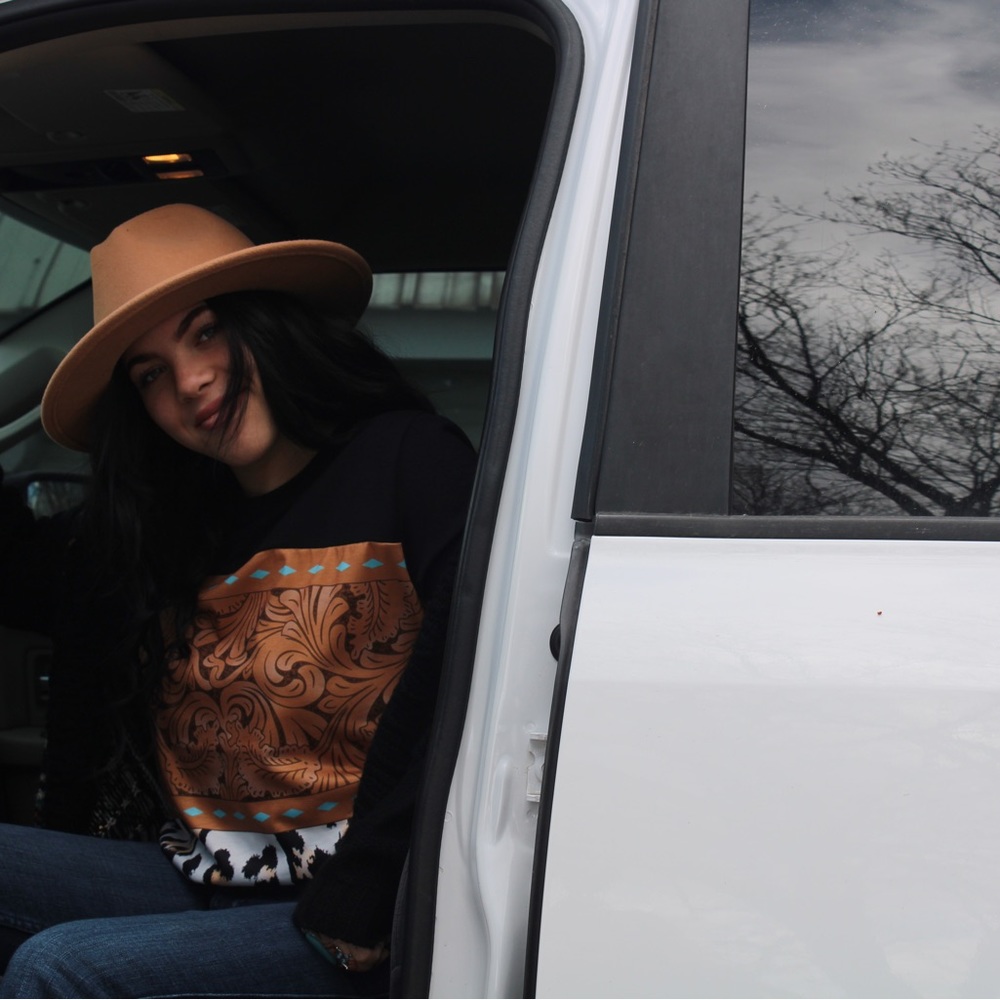 New leopard and tooled leather look T-shirt from our boutique!